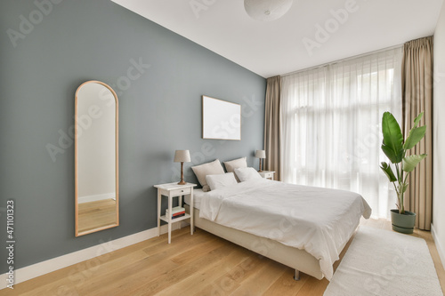Interior of stylish bedroom in modern apartment