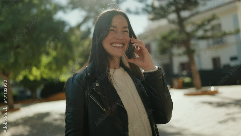 Young hispanic woman smiling confident talking on the smartphone at park Young hispanic woman smiling confident talking on the smartphone at park