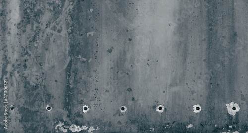 Grunge stone background with bullet holes
