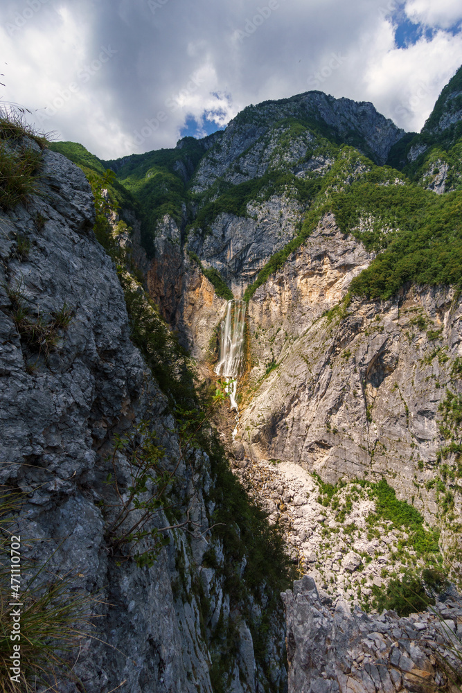 Famous waterfall slap Boka on sunny summer day in Julian Alps in Triglav National park, Slovenia
