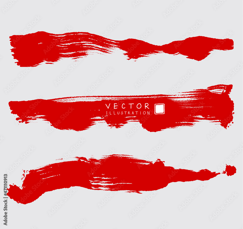 Red ink brush stroke on white background.