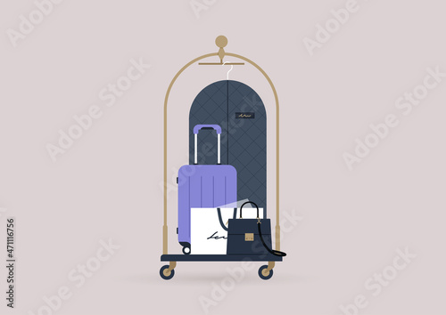 A hotel luggage cart loaded with suitcases and bags
