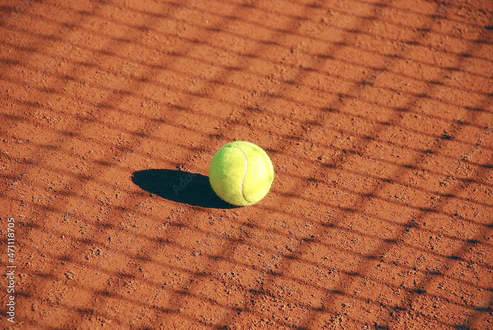 Tennis court with a tennis ball