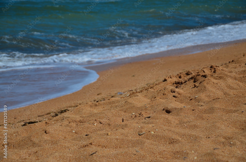Sea breeze in waves, on the shore of a sandy beach. The most beautiful beach Sea breeze in waves, on the shore of a sandy beach. The most beautiful beach