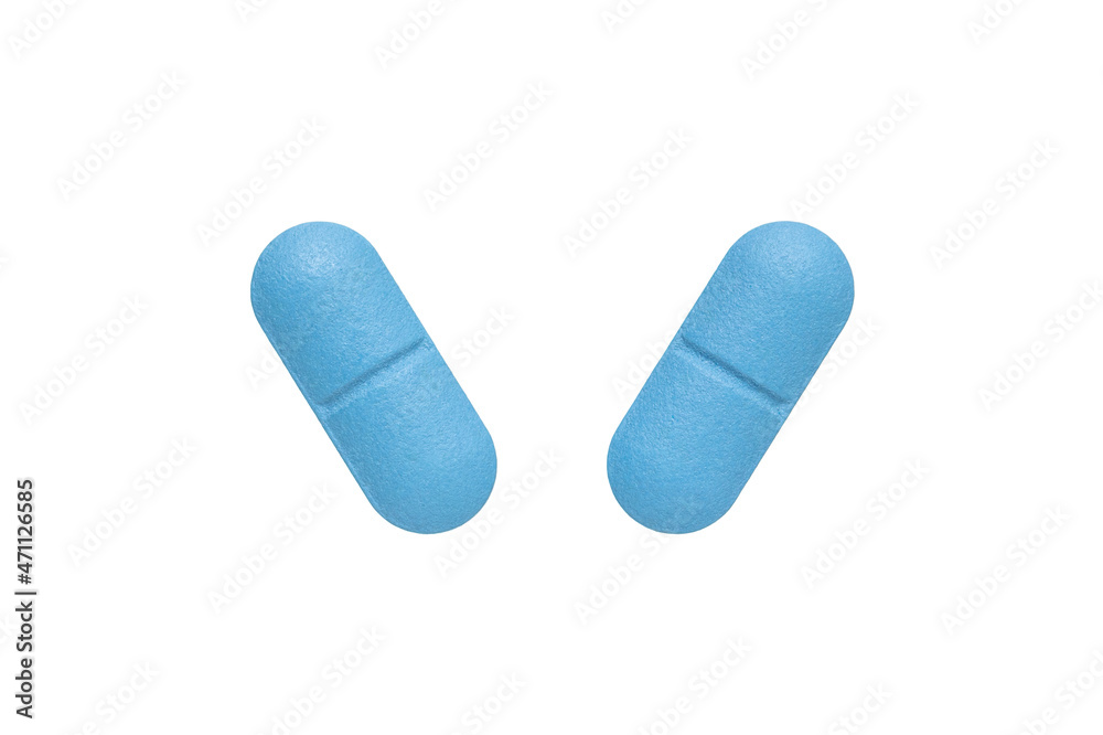 Blue oval pills isolated on white background. Blue oval pills isolated on white background.