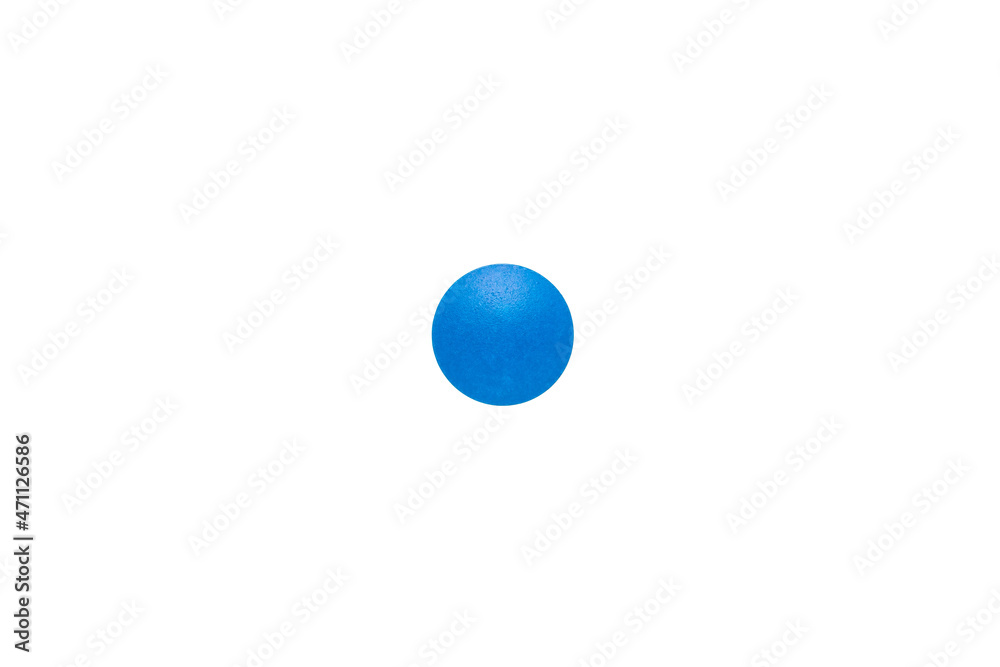 Blue round pill isolated on a white background. A small round mass of solid medicine. Blue round pill isolated on a white background. A small round mass of solid medicine.