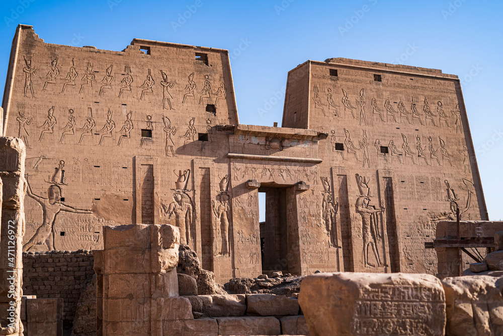 Impressive main facade of the Temple of Edfu decorated with precious hieroglyphs. Photograph taken in Edfu, Egypt.
hieroglyphs 