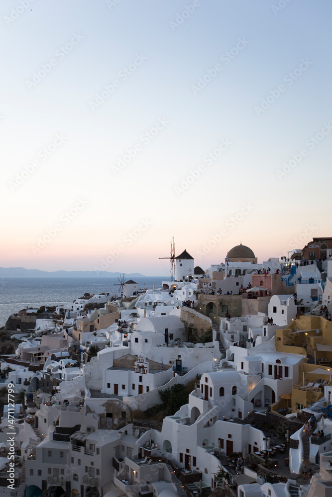 Fototapeta premium Oia village on Santorini island in Greece at sunset