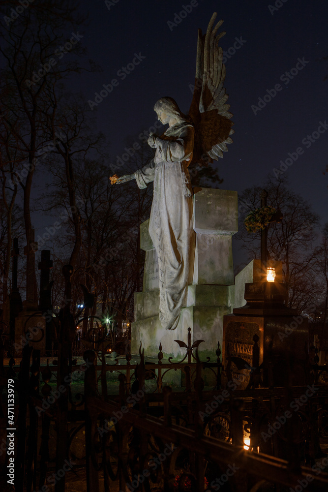 Candles lit up on All Souls Day in Bernardine cemetery of Vilnius, Lithuania