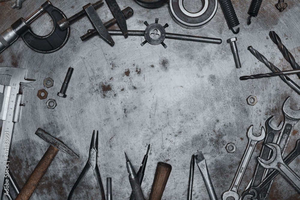 Hand tools on metal surface