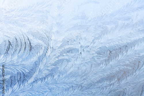 Beautiful frosty pattern on the window. Ice pattern. Texture.
