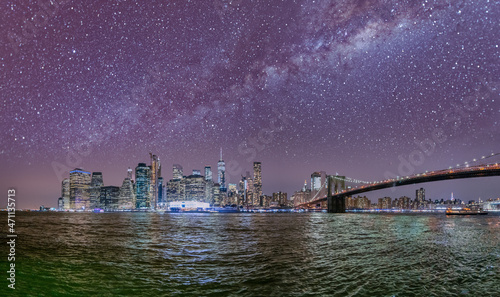 Amazing starry night sky over Lower Manhattan, New York City - USA.