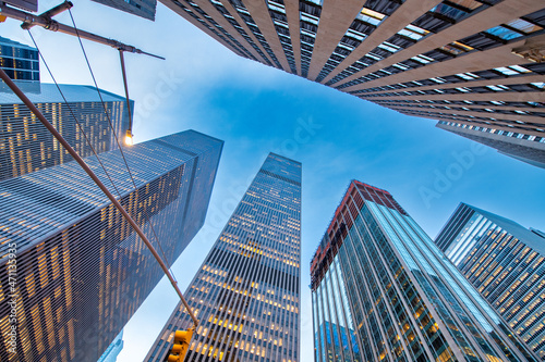 Modern skyscrapers of Midtown Manhattan Business District at sunset
