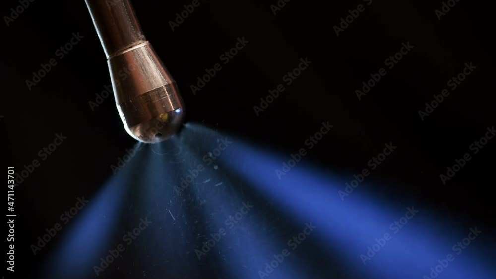 Close up shot of steam flow from coffee machine, black background Close up shot of steam flow from coffee machine, black background