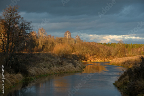 the Russian landscape - the river and the wood in the fall