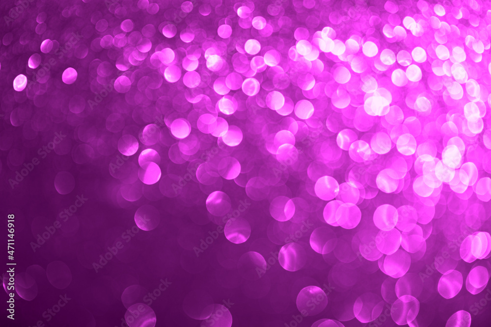 Festive abstract blurred glitter background violet color. Bokeh effect. Holiday decoration concept.