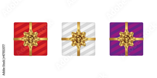 Colorful gift boxes packed with bright yellow bow.