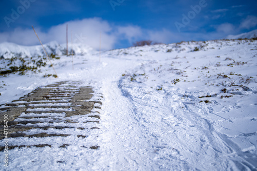 富山県立山町にある立山の冬の雪景色のある風景 Landscape with snowy winter scenery of Tateyama in Tateyama Town, Toyama Prefecture, Japan. photo