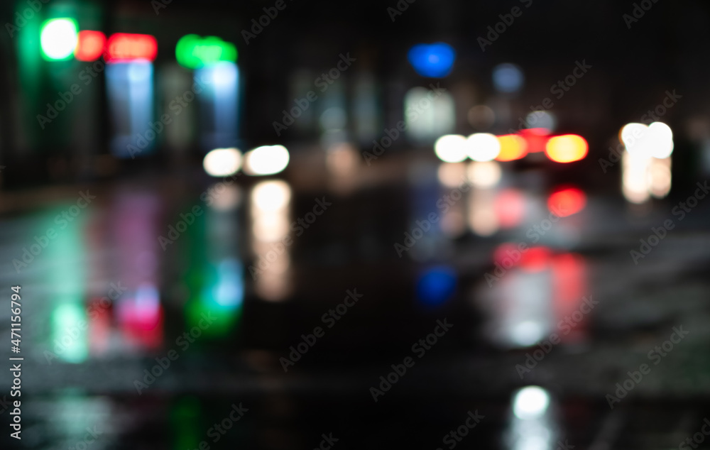 Defocused image of car lights and street lighting Defocused image of car lights and street lighting