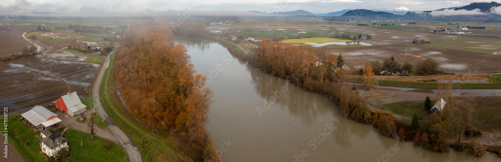 Fog Rolls in Over the Skagit Valley and the Skagit River on a Beautiful Autumn Morning. Aerial drone view of this magnificent area of western Washington state. 