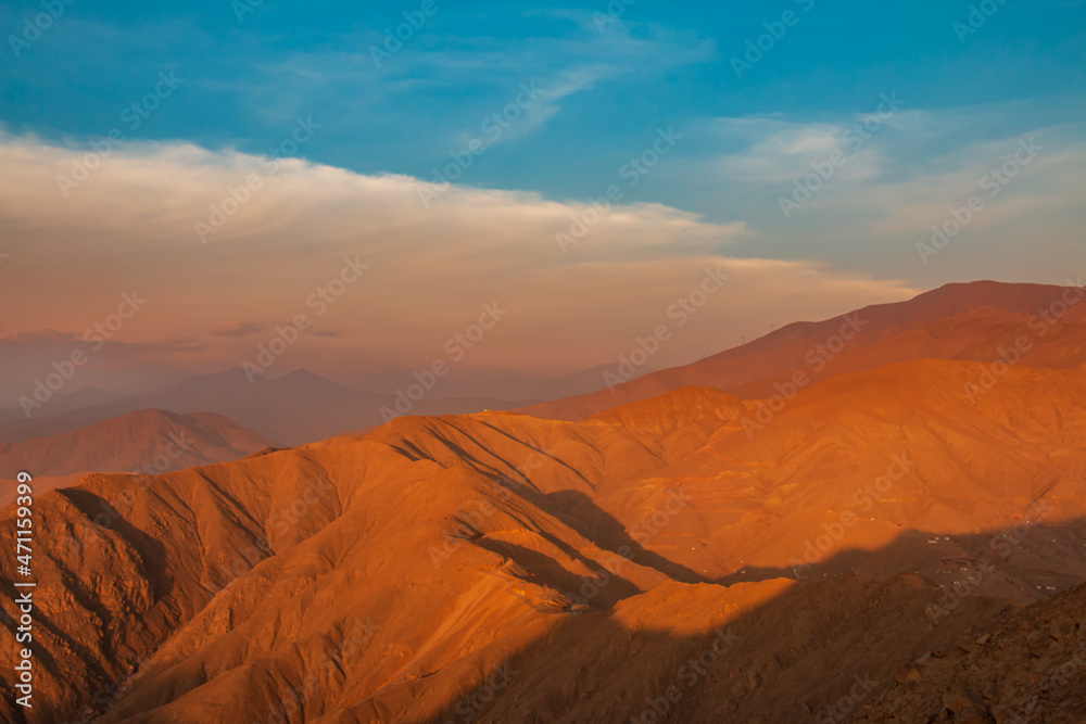 mountainous landscape, view from the top of a mountain, blue sky.