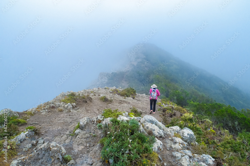 Woman alone hiking