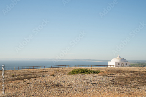  Espichel s cape on portuguese coast. A beautiful landscape of Portugal. Blue sky and big cliff