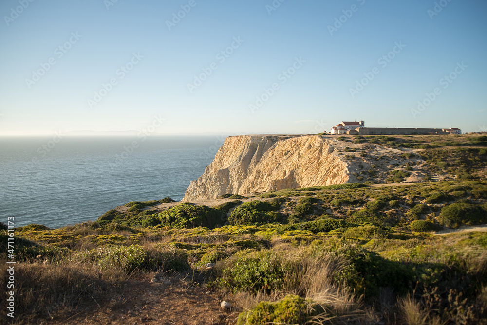  Espichel's cape on portuguese coast. A beautiful landscape of Portugal. Blue sky and big cliff