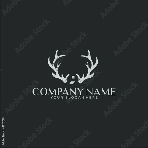 Logo negative space deer antlers with a house in a rustic style