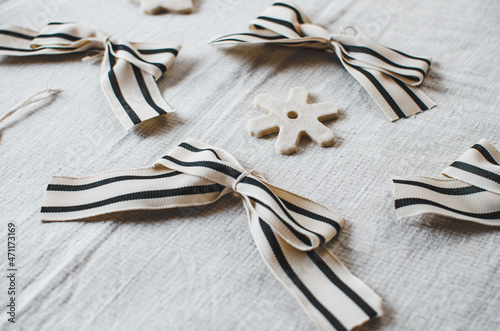 Zero waste Christmas tree decoration- fabric bow. 
Black and white bow made of natural fier and wired ribbon to be used as christmas decorations