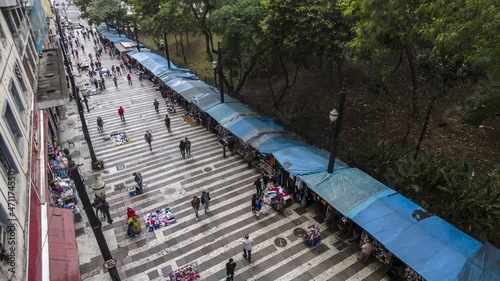Time lapse of people walk along the General Carneiro street in Sao Paulo, Brazil. photo