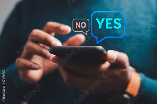 decision idea yes no Businessmen opt for online business investments. via smartphone 