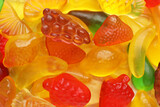 Tasty jelly candies in shape of different fruits, closeup