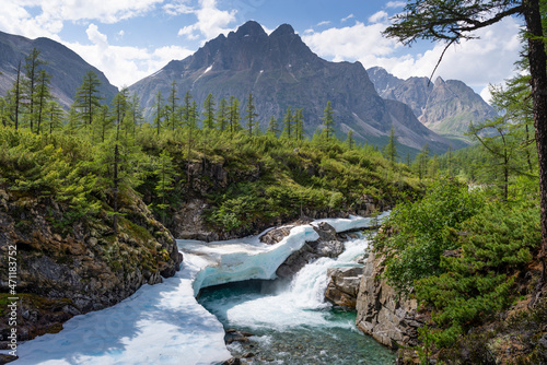 The beautiful valley of the Middle Sakukan river against the backdrop of the Kodar mountain range. Trans-Baikal Territory, Kodar National Park.