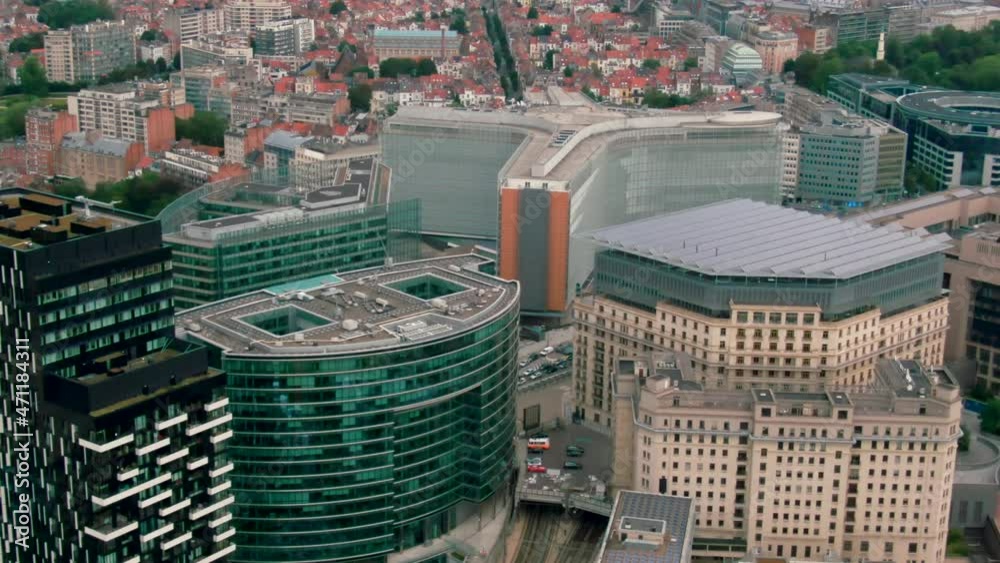 Establishing Aerial View of Brussels Downtown with Political Landmark - headquarters of the EU Commission Berlaymont in European Quarter. Office buildings in Bruxelles, Belgium. 4K drone zoom in shot