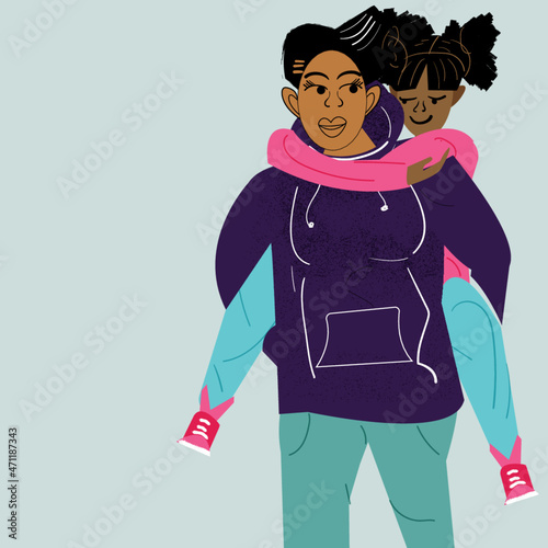 Lesbian parent giving daughter piggy back ride
