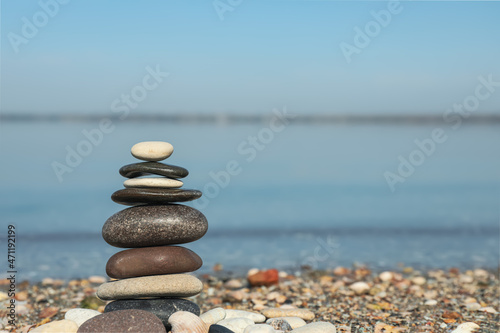 Stack of stones on beach  space for text. Harmony and balance concept
