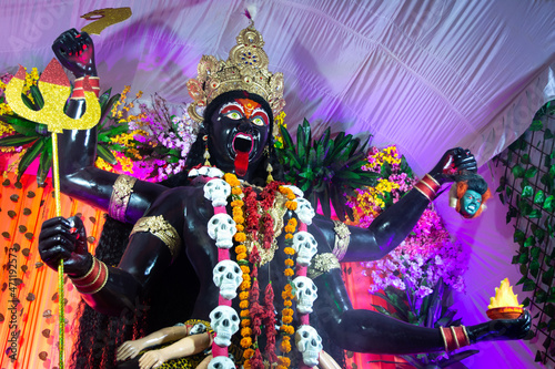 Idol of hindu goddess kali during navratri festival photo