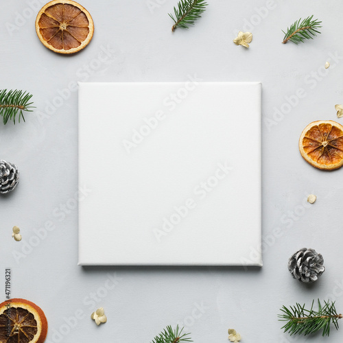Blank frame canvas and Christmas decoration. Copy space for message or photo. Christmas, New Year concept. 