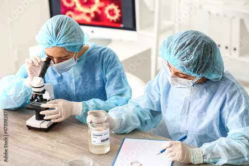 Scientists developing covid...