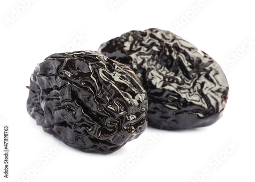 Sweet dried prunes on white background. Healthy snack
