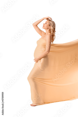 Young pregnant woman in lig...