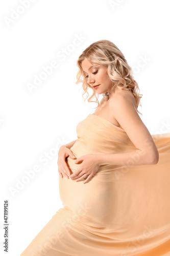 Young pregnant woman in lig...