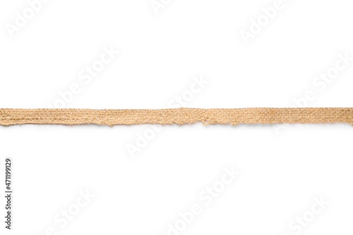 Thin burlap ribbon on white background, top view