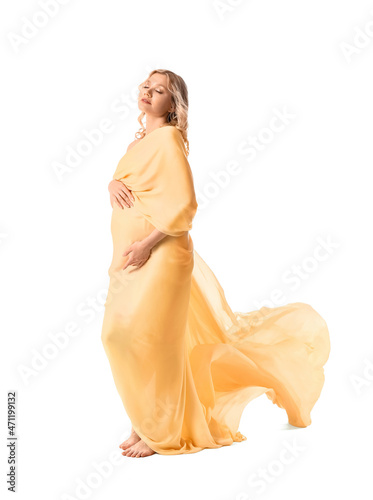 Young pregnant woman in lig...