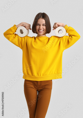 Funny young woman with toil...
