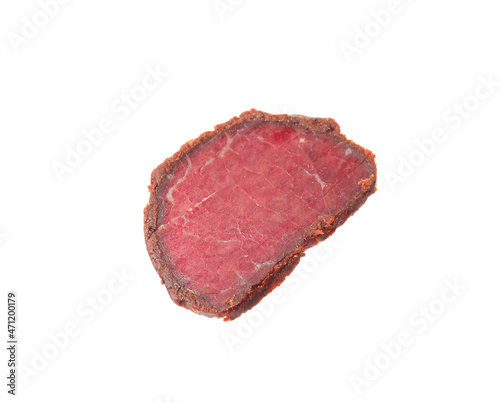 Delicious dry-cured beef basturma slice isolated on white