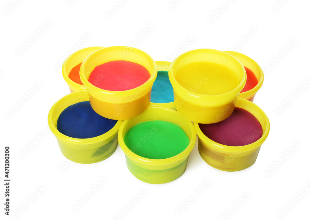 Plastic containers with colorful play dough on white background Plastic containers with colorful play dough on white background