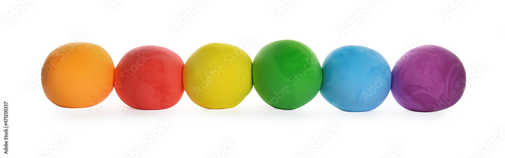 Row of color play dough balls isolated on white Row of color play dough balls isolated on white