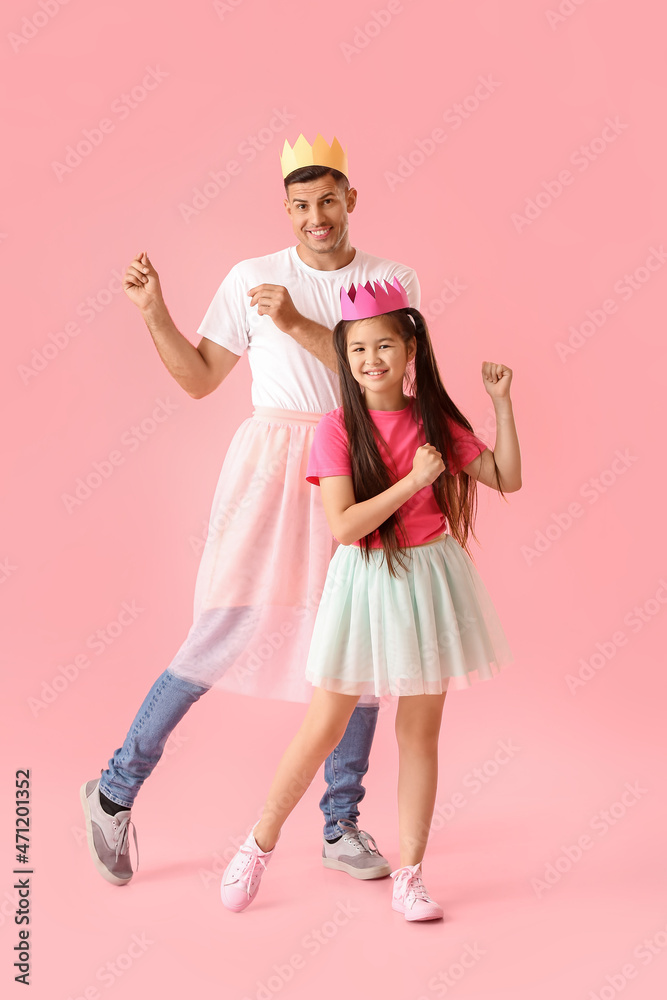Dancing man and his little daughter on color background Dancing man and his little daughter on color background